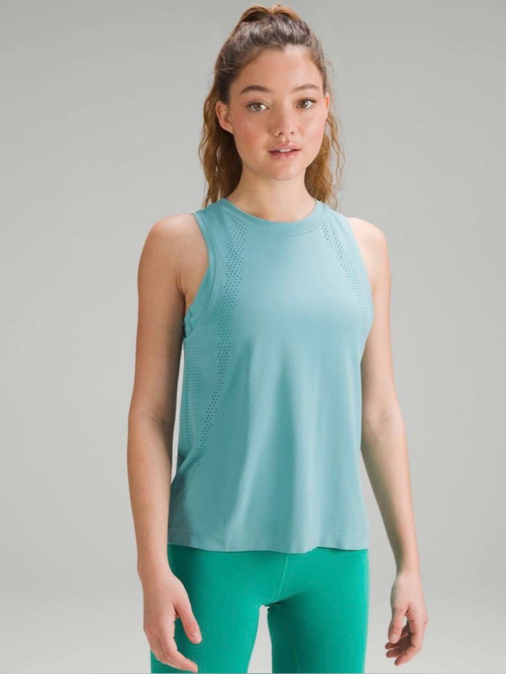 Lululemon Train To Belightweight teal tank top.
